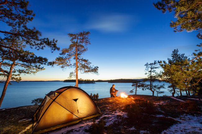 Backpackers - beautiful fire by lake